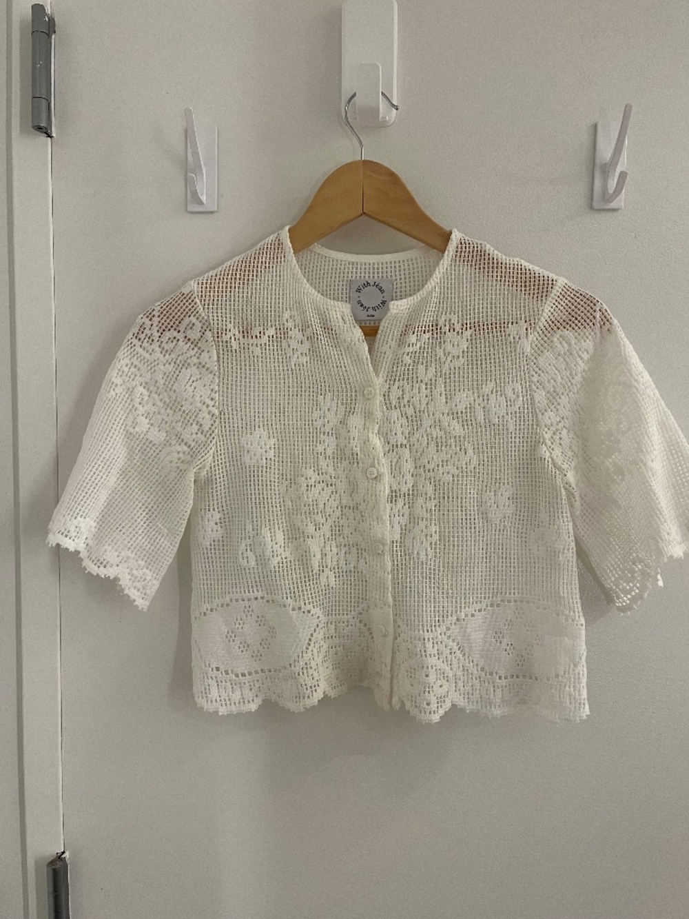 White "With Jean" button up baby tee